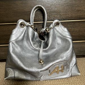 Anya Hindmarch silver leather handbag with gold accent